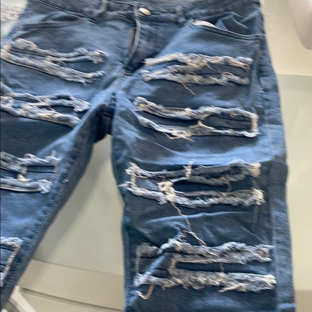 Distressed Blue Jeans